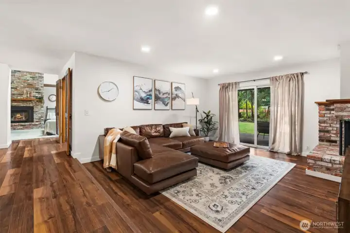 This spacious living room anchors the open floor plan, offering the perfect spot to unwind, relax, or gather with loved ones in a bright, inviting atmosphere. This spacious living room anchors the open floor plan, offering the perfect spot to unwind, relax, or gather with loved ones in a bright, inviting atmosphere.