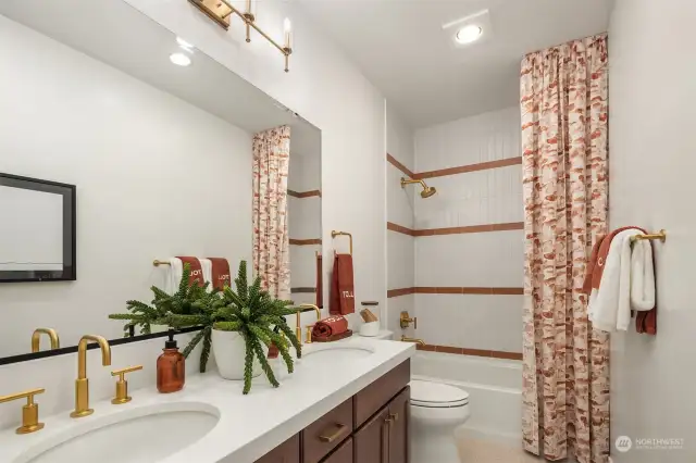 Top floor guest bath. Photo of the Alabaster model home, includes upgrades & is not of actual home listed for sale.