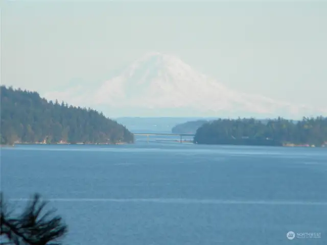 Enhanced view of Mount Rainier floating over the Indian Island bridge.