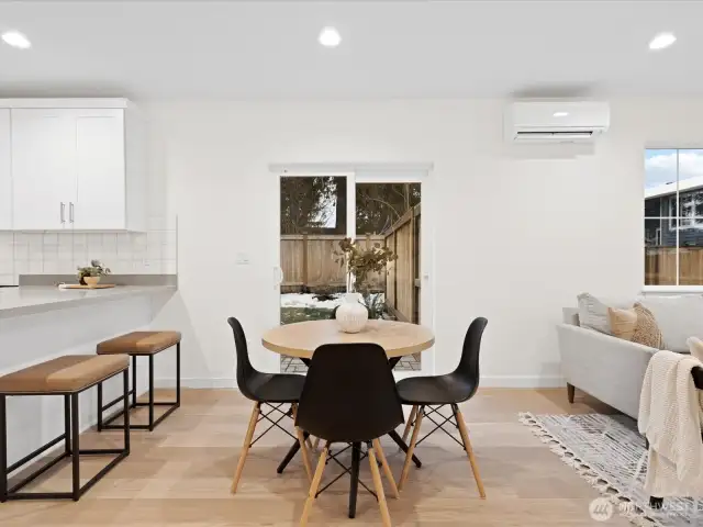 Space for a dining table along with the breakfast bar.