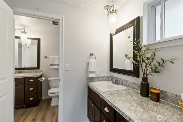 vanity and sink can be closed off from the other side of the bathroom for extra privacy.