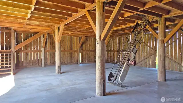 Lower level of Barn with hay conveyor