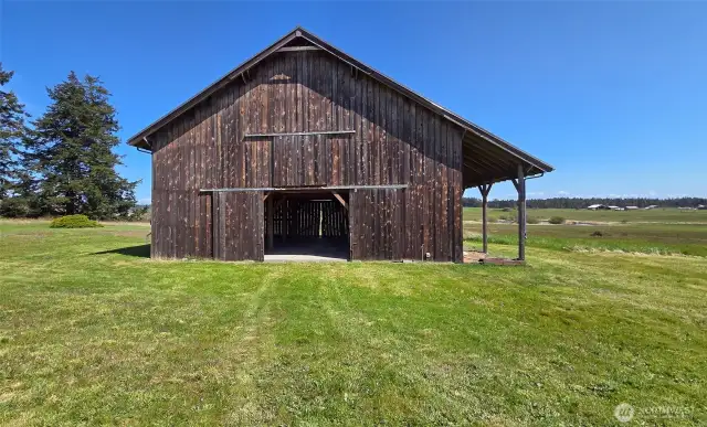 Barn with pasture behind