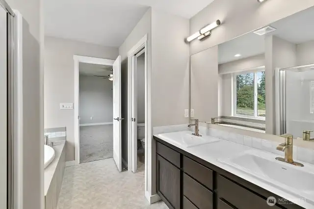 Home is under construction.  Photos are of a previously bult home in a different community with similar finishes.  Builder reserves the right to make changes to plans & specifications without notice.  Features vary by plan.  Buyer to verify square footage.