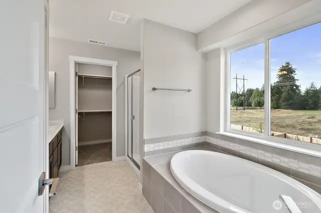 Home is under construction.  Photos are of a previously bult home in a different community with similar finishes.  Builder reserves the right to make changes to plans & specifications without notice.  Features vary by plan.  Buyer to verify square footage.