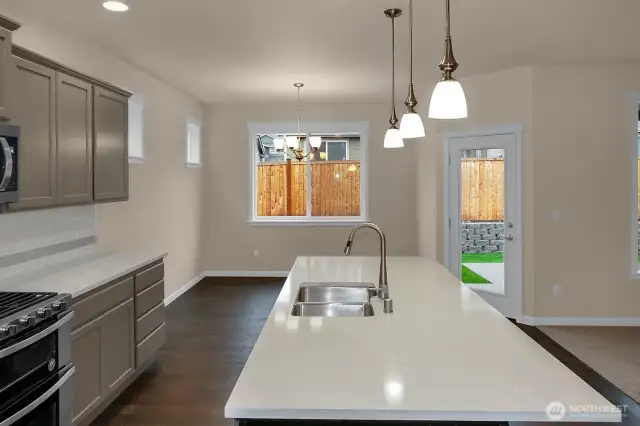 Home is under construction.  Photos are of a previously bult home in a different community with similar finishes.  Builder reserves the right to make changes to plans & specifications without notice.  Features vary by plan.  Buyer to verify square footage.