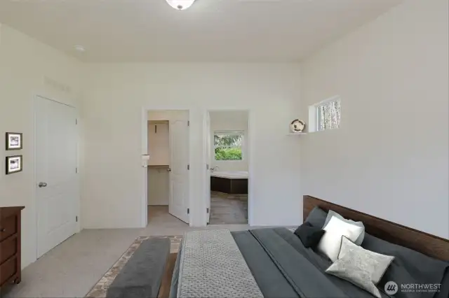Primary Bedroom, view of Walk in closet and Primary bathroom facing west