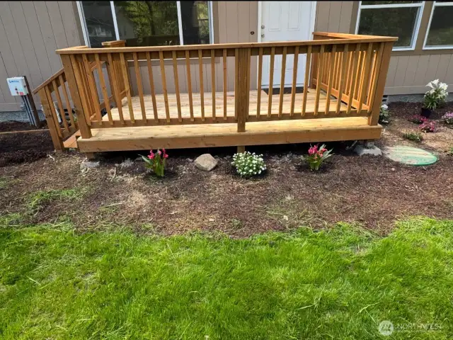A deck to relax and perennials to enjoy for years to come.