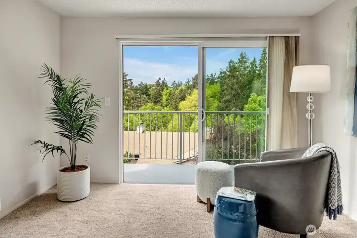 The large sliding door to the deck and window to the left (un-seen here) let in lots of natural light.