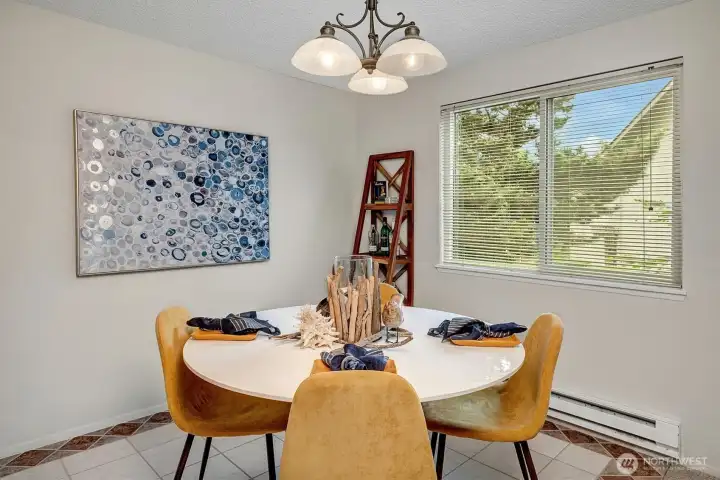 Unlike many condos, this isn't looking into other units, this overlooks trees and neighbor's garden area.