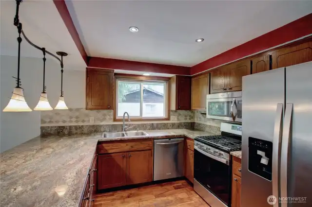 Granite counters and a large eating bar