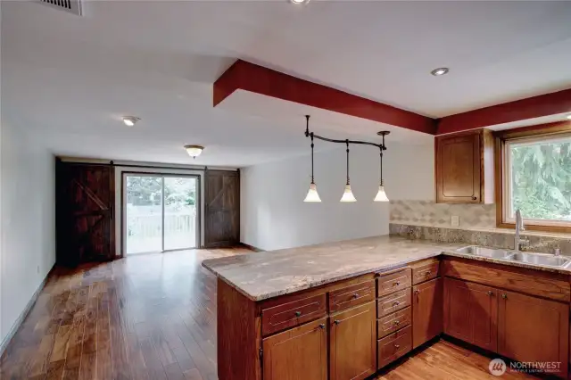 Looking into the family room with large barn doors