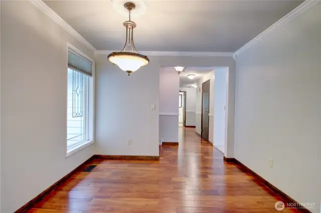 Dining room between the living room and kitchen