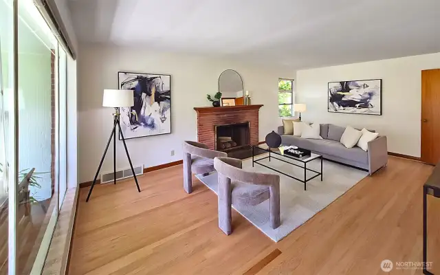 Inviting entry opens to spacious living room with newly refinished hardwood floors.