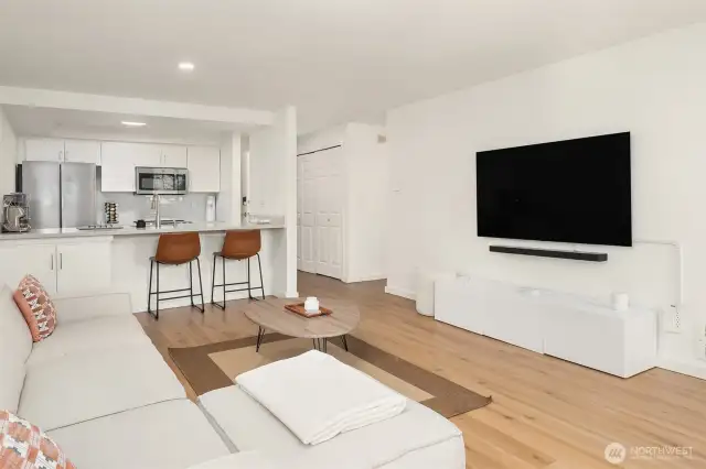The living room and kitchen flow beautifully in this open floorplan for stylish entertaining.