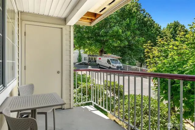 Enjoy this cozy deck with western light exposure and storage.