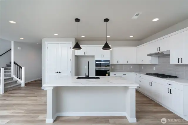 Photos are of a home in a different community and are for illustration purposes only to reflect typical finishes.  May depict seller enhancements.  Colors and options may vary.
