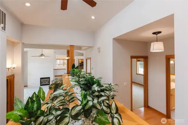 Indoor planter boxes with watering system and skylights