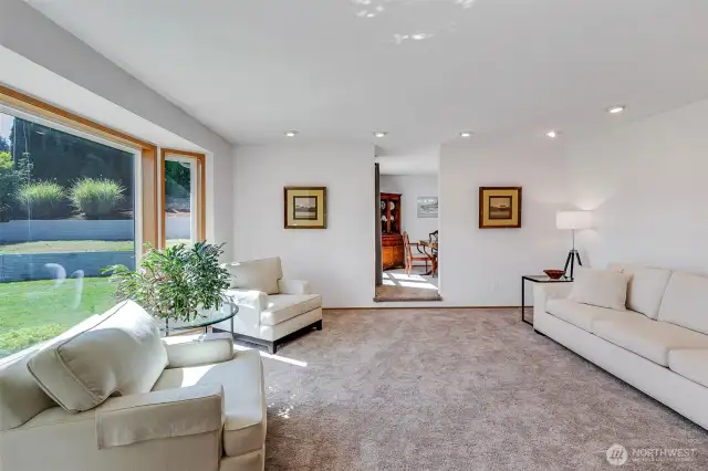Floor to Ceiling Windows in the Living & Dining rooms Bringe an abundance of Natural light into this home!