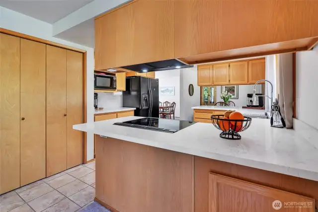 Quartz Counters, easy reach Pantry and Updated Large Undermount Stainless Steel Kohler sink with strainer and prep board