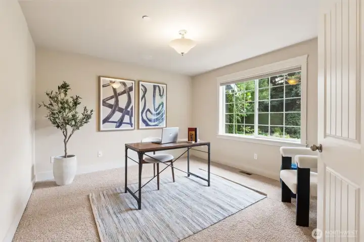 The office is ideally located just off the foyer. There is beautiful natural light in this room.