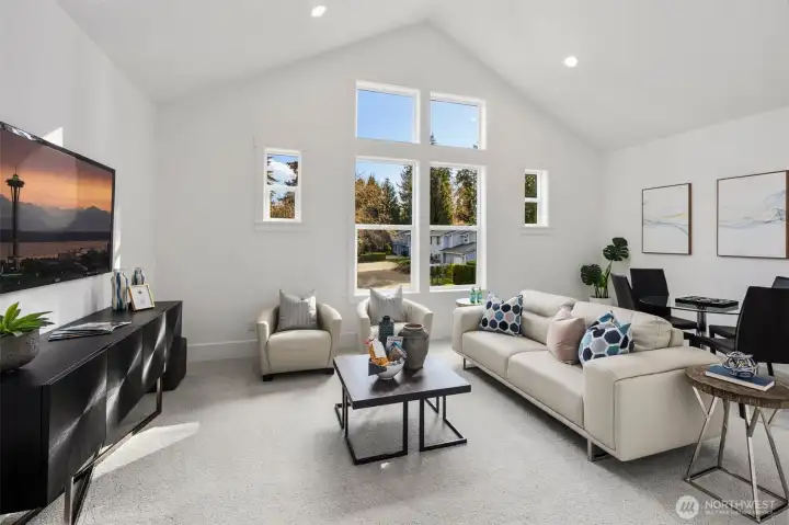 Upper Floor Bonus Room w/ Oversized Windows And Attached Bathroom.