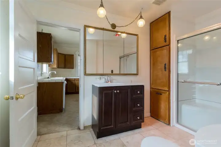 3/4 bath accessed via kitchen and primary