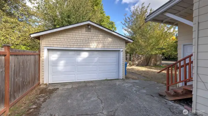 Convenient detached garage with secure parking and workspace potential.