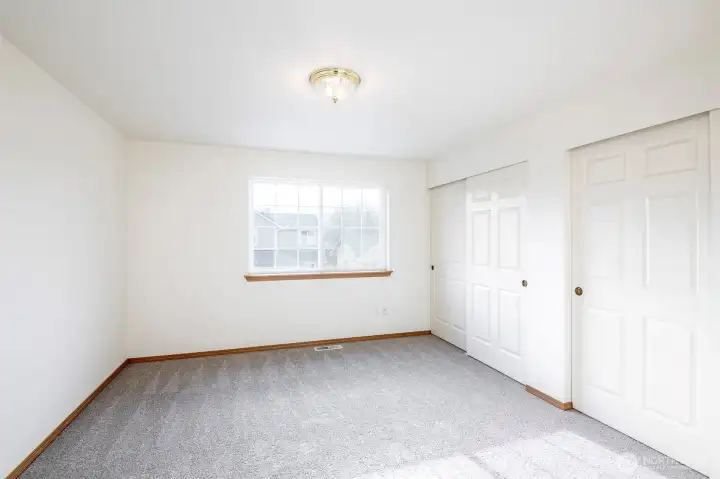 Primary bedroom with double closets