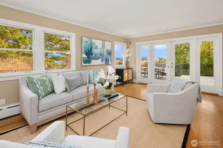 Family offers French doors that lead to deck.