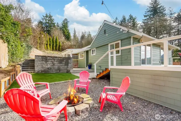 Enjoy the private backyard equipped with astro turf, fire fit, covered area and garden beds.