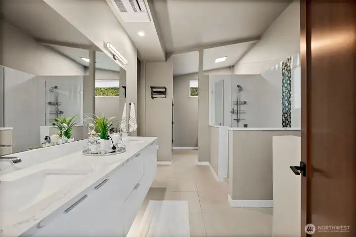 Primary bathroom in this River Rock home in Auburn features a spa style layout with dual vanity, modern finishes, walk in shower, and a freestanding soaking tub. The bright and spacious design creates a relaxing retreat with clean lines and contemporary comfort. Primary bathroom in this River Rock home in Auburn features a spa style layout with dual vanity, modern finishes, walk in shower, and a freestanding soaking tub. The bright and spacious design creates a relaxing retreat with clean lines and contemporary comfort.