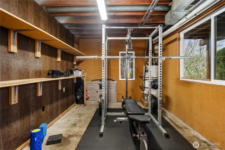 The downstairs studio has a private door to the back yard. Perfect space for a shop, home gym, art studio or crafting space.