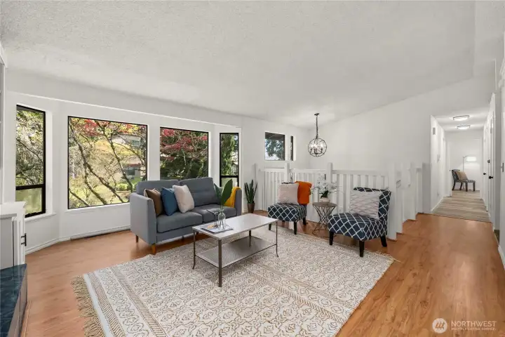 New plank flooring, fresh paint in this light and bright living space