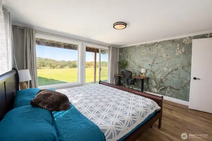 Large Bedroom that opens onto back patio main floor