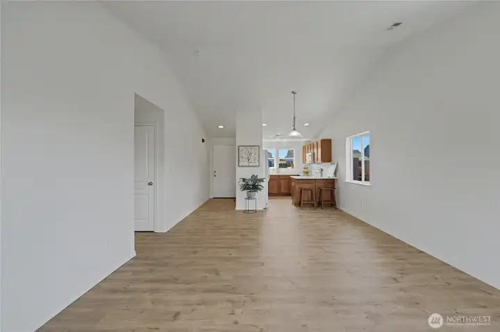 Spacious living area with vaulted ceilings
