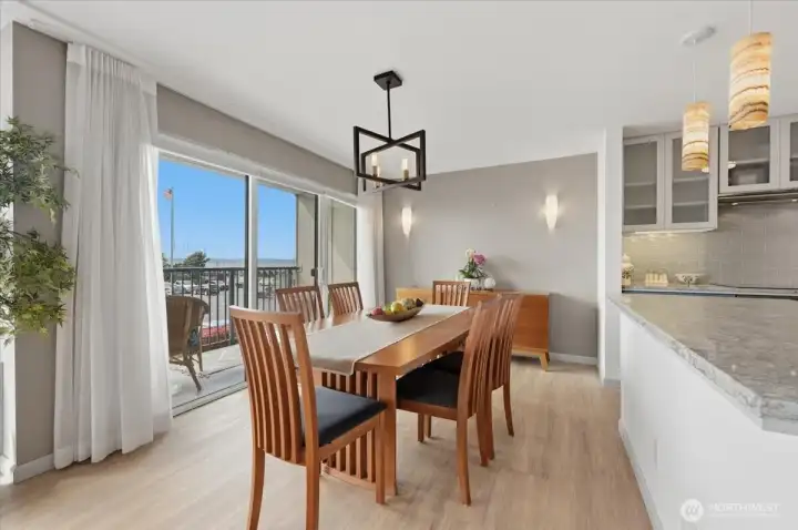 Sound and Marina views from the dining space Control your privacy and comfort at all levels with electronic panel blinds and beautiful sheer drapes. Complimenting wall colors to show off wall sconces and lighting choices as you enjoy the sunsets.