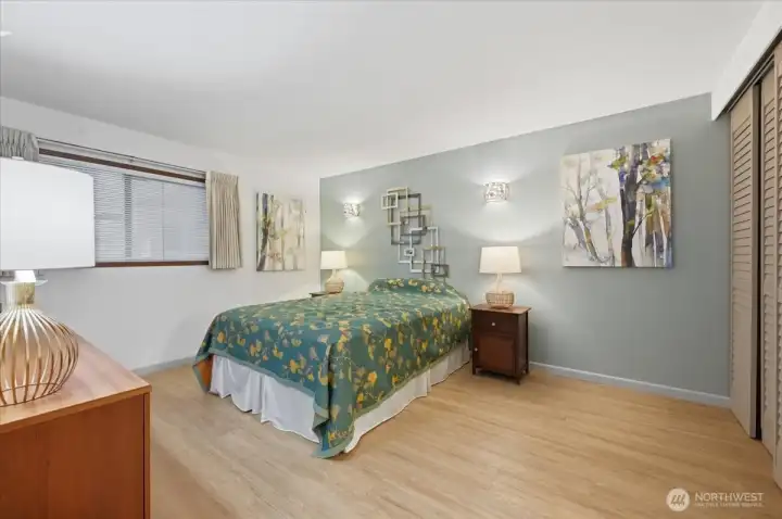 Warm and comfortable tones to relax the day away. Spacious primary bedroom offers multiple room configurations. Attention to details in the updates.  Closet with custom organize system, single panel doors for maximum open space.