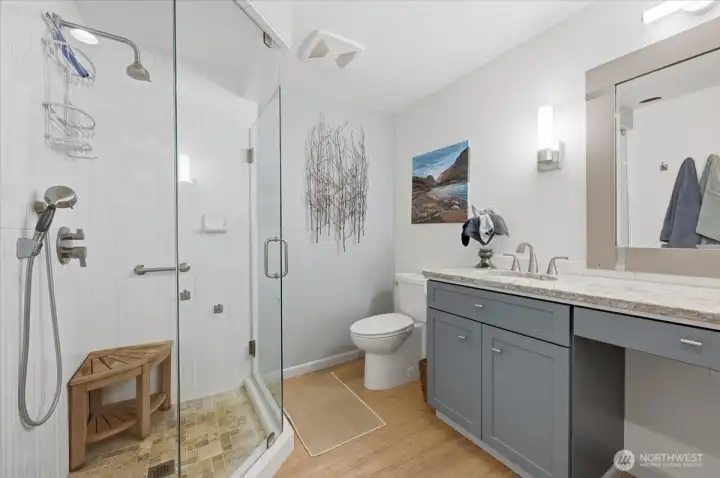 Corner glass shower with dual shower heads make the most of the square footage - Excellent attention to details.