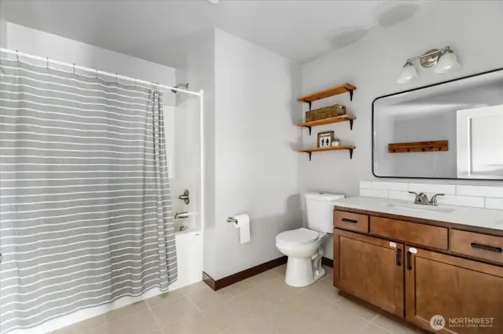 Downstairs full bathroom.