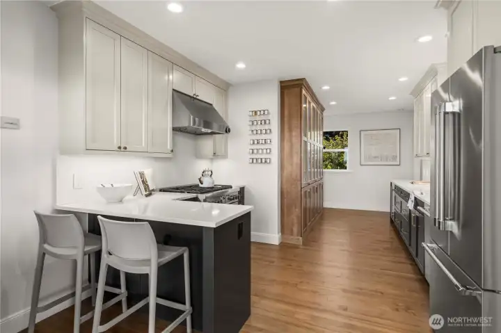 Fully remodeled galley style kitchen, all new appliances convey.
