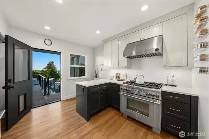 Stunning views from your kitchen with access to a large deck/patio.