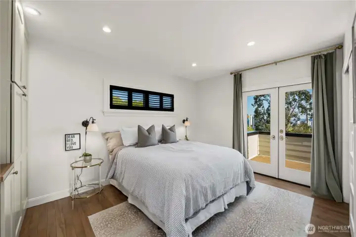 Primary bedroom with french doors to the balcony!