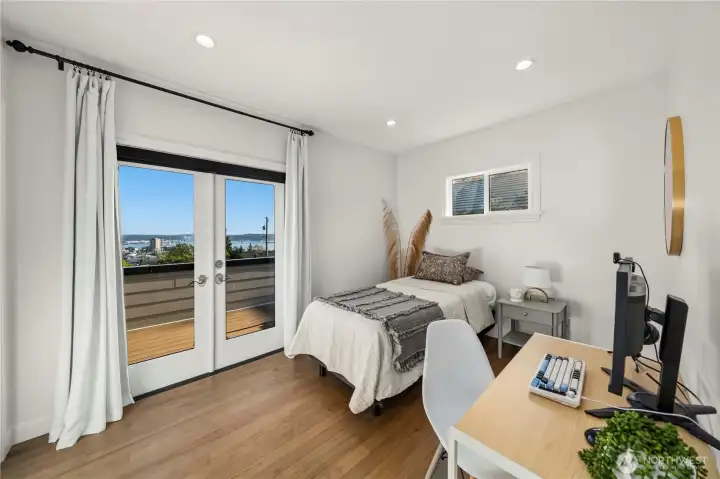 2nd bedroom on 2nd floor with french doors to patio and beautiful views!