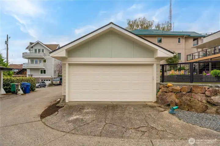 True 2 car garage with plenty of space for cars & hobbies!