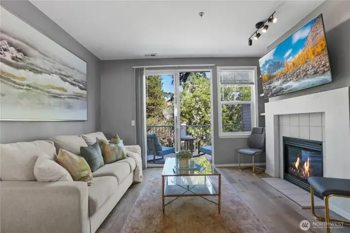 Spacious open-concept living with large windows bringing in beautiful natural light.