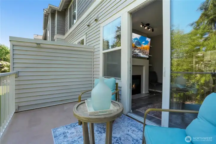 Enjoy seamless indoor-outdoor living with a peaceful patio setting.