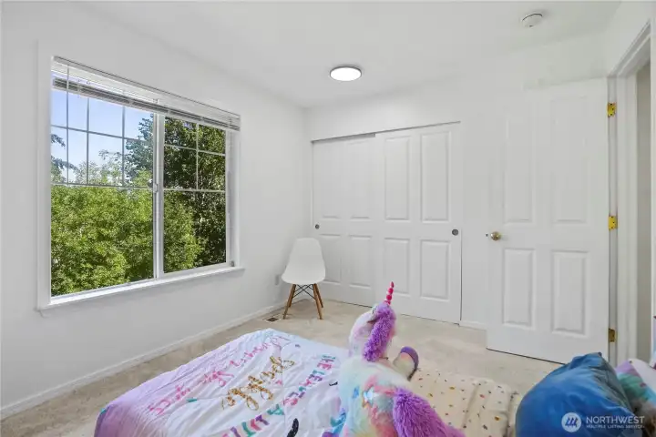 Comfortable secondary bedroom with great natural light, large closet and flexible functionality.