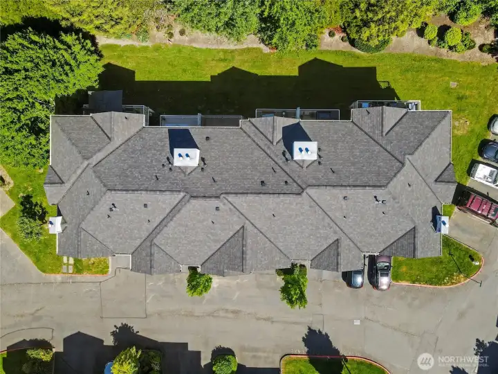 Aerial rooftop angle provides a clear overview of the building footprint and nearby surroundings for full context.