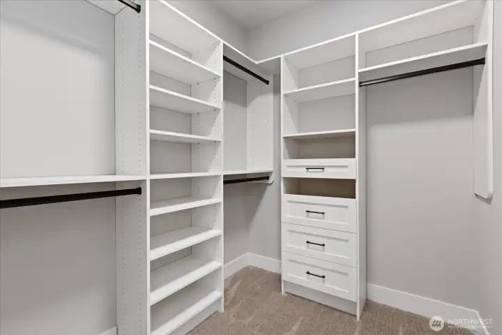 Upper Level Primary Bedroom Walk-in Closet Upper Level Primary Bedroom Walk-in Closet